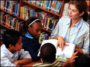 Photo: A teacher with students