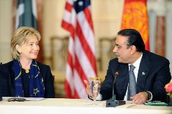 Date: 05/06/2009 Description: Secretary Clinton talks with Pakistani President Asif Ali Zardari at the U.S.-Afghanistan-Pakistan Trilateral Consultations II .  State Dept Photo