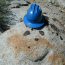 hardhat on rock with lichen