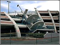 Photo of a parking garage damaged by an earthquake.