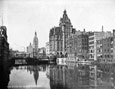 View across a body of water to a row of buildings