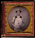 Man in a work apron and hat