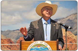 Secretary of the Interior Ken Salazar at the Red Rock National Conservation Area near Las Vegas, Nevada, announces $305 million will be invested by the Bureau of Land Management in funds that will restore landscapes, development renewable energy and create jobs.  (Photo credit: Andy  Pernick, Bureau of Reclamation)