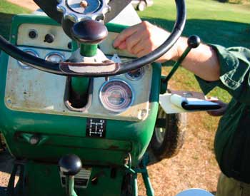 Figure 3. Location of tractor starter key, gearshift and steering wheel.