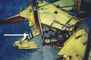 welded skid of the corn 
chopper head with arrow pointing to the weld on a skid