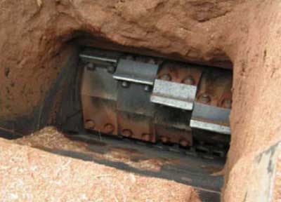 inside the infeed chute of the wood chipper