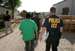 ICE agents escorting man