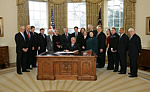 President Bush signs Human Trafficking Bill