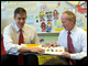 Secretary Duncan and Steve Barnett, director of the National Institute for Early Education Research (NIEER), read to students at Oyster-Adams Bilingual Elementary School (pre-K through 8) in Washington, D.C.