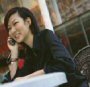 Picture of a working women on the phone. Pictue from the cover of the Flex-Options Guide
