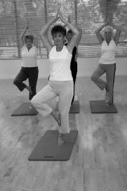 Photo of women doing yoga