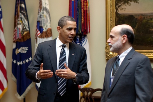President Barack Obama confers with Federal Reserve Chairman Ben Bernanke following their meeting at the White House, April 10, 2009