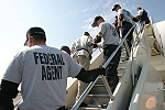 Illegal Immigrants Board Plane With Onlooking ICE Agents