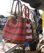 Fake handbags were one of the counterfeits being sold in an established flea market at New Orleans