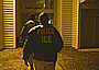 ICE Police entering an apartment complex.