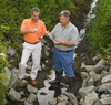 Examining water quality in a drainage ditch, Photo by Peggy Greb, ARS Image D631-2