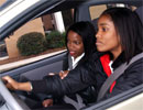 Image of mother and daughter wearing seatbelts