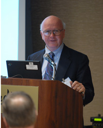 Photo of James A. Dowds speaking at podium