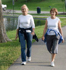 Photo of two women walking.