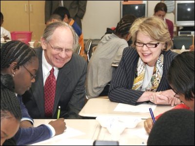 Secretary Spellings and Congressman Castle watch students working on a geometry problem at David W. Harlan Elementary School in Wilmington, Delaware.