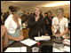 Secretary Spellings participates in chemistry experiments at T.C. Williams High School in Alexandria, Virginia.