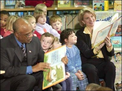 Secretary Paige and Congresswoman Shelley Moore Capito celebrate National Library Week by reading to children at the Kanawha County Public Library (April 7, 2003).