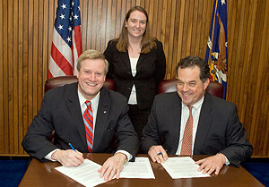 (L to R, sitting) Edwin G. Foulke, Jr., then-Assistant Secretary, USDOL-OSHA; Joseph Casper, Vice President, Environment, Health and Safety, BIA; (Standing) Michaela Rydstrom, Assistant, Environment, Health and Safety, BIA; at the national Alliance renewal signing on March 27, 2008.