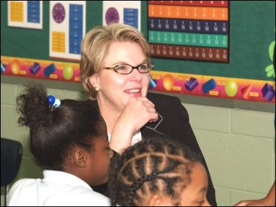 Secretary Spellings sits with students in a classroom at Orchard Knob Middle School in Chattanooga, Tennessee.