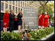 Senator Kay Bailey Hutchison of Texas, Representative Gene Green of Texas, Secretary Spellings, Lynda Johnson Robb, and Luci Baines Johnson unveil the new sign in front of the ED building renamed to honor Lyndon B. Johnson.