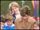 Secretary Spellings and Green Bay Packers Quarterback Brett Favre look on as First Lady Laura Bush cuts the ribbon on a new playground at Hancock North Central Elementary School in Kiln, Mississippi.  In 2005, Hurricane Katrina damaged Hancock North Central Elementary's playground where Favre played as a child. White House photo by Shealah Craighead