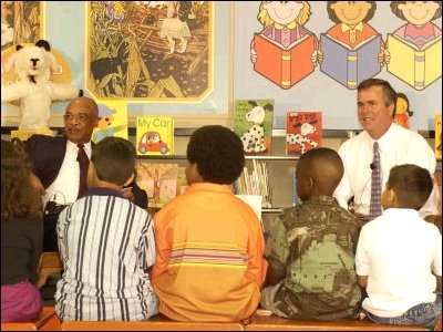 Sec. Paige and Gov. Bush participate in Phone Line Story Time, a new program under the "Just Read, Florida!" initiative.