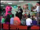 Sec. Paige and Gov. Bush welcome Barney to "Phone Line Story Time," a new program under the "Just Read, Florida!" initiative at the Orange County Public Library.