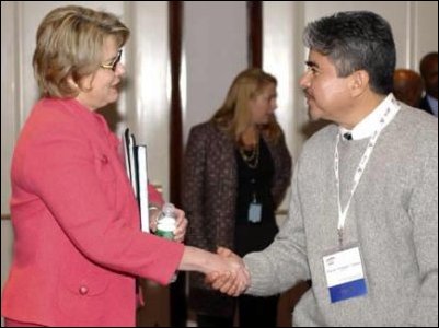 Secretary Spellings meets with Ricardo Campos during the Hispanic Parents Roundtable at the summit of the Office of English Language Acquisition (OELA) in Washington, D.C.