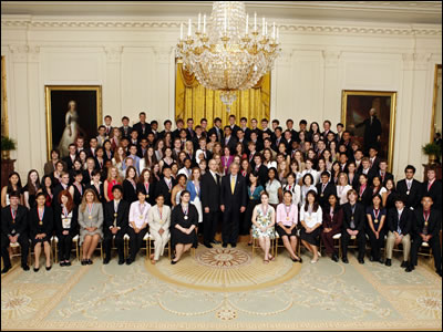 President Bush and Deputy Secretary Simon with the 2006 Presidential Scholars in the East Room.  Established in 1964, the Presidential Scholars Program recognizes up to 141 distinguished graduating high school seniors. White House photo by Paul Morse