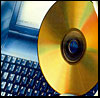 Photograph of a CD and computer.