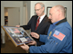 Commander Scott Kelly discusses Space Shuttle Endeavour's STS-118 mission with Deputy Secretary Simon.