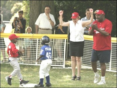Secretary Spellings cheers for tee ball players at the White House Tee Ball game.