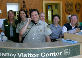 Pam, Janel, Lee, Laura, Jessica, and Autumn at the Interagency Visitor Center counter.