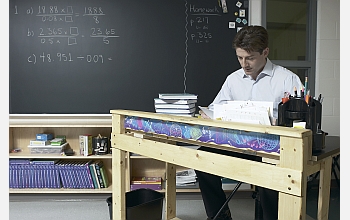 Math teacher at desk