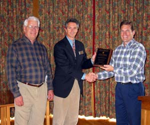 J.D. Danni, the Wyoming OSHA Program Manager, awards a VPP Merit plaque to Jim McCaleb of Xanterra Parks and Resorts. Also pictured is Ed Carlson, Wyoming OSHA VPP Manager.