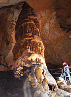 At 65 feet tall, the Pillar of Hercules towers over visitors to Gap Cave.