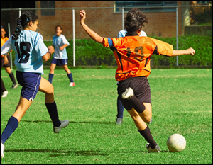 Photo of kids playing soccer