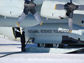 Photo of a ski-equipped Hercules LC-130 refueling in Antarctica.