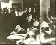 President Willam Howard Taft signs legislation