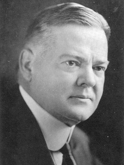 Black-and-white photo of Herbert Hoover in a high starched-collar shirt, tie, and jacket.