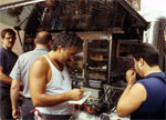 Four men at a lunch wagon