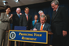 Image of President Bush signing the Pension Protection Act of 2006 on August 17th