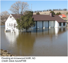 Flood water surrounding a building at Arrowwood NWR in North Dakota.