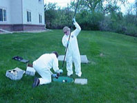 Waste samples being collected from an onsite wastewater system for analysis of emerging contaminants. A strict protocol was followed to prevent contamination of the samples