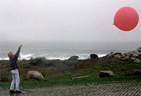 Clark King launches a rawindsonde during the CALJET program to improve the forecast of West Coast winter storms.